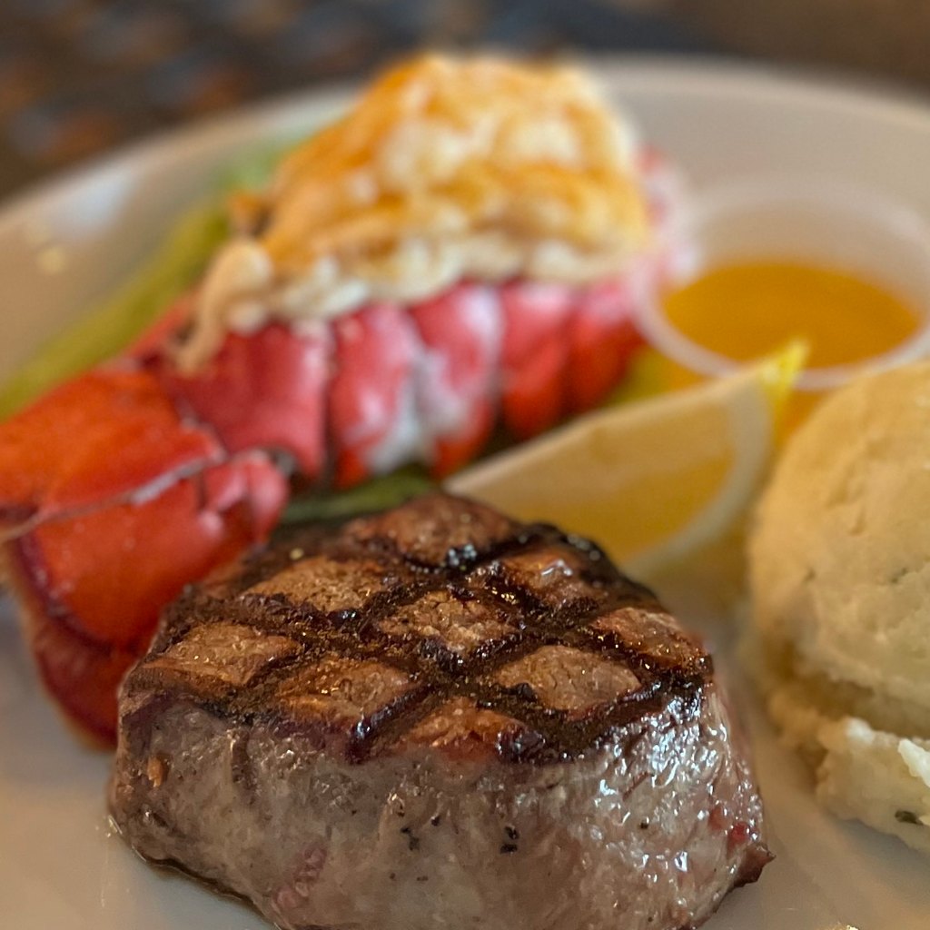 Grilled filet mignon with lobster tail and mashed potatoes at The Tartan of Redlands